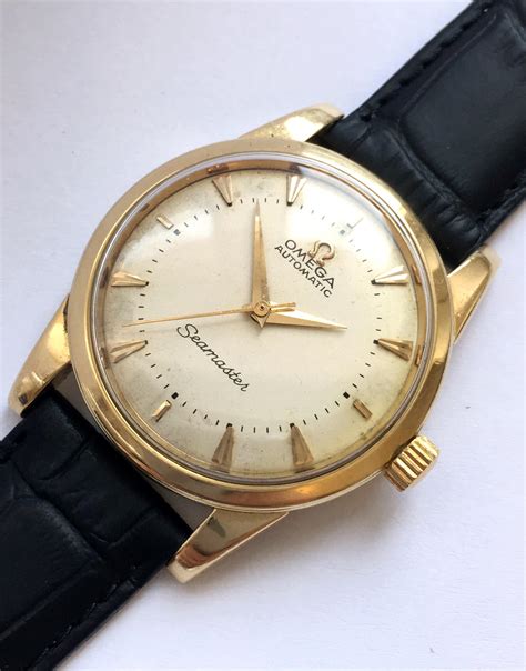 18k mens gold omega watch white face date leather band|omega gold watches.